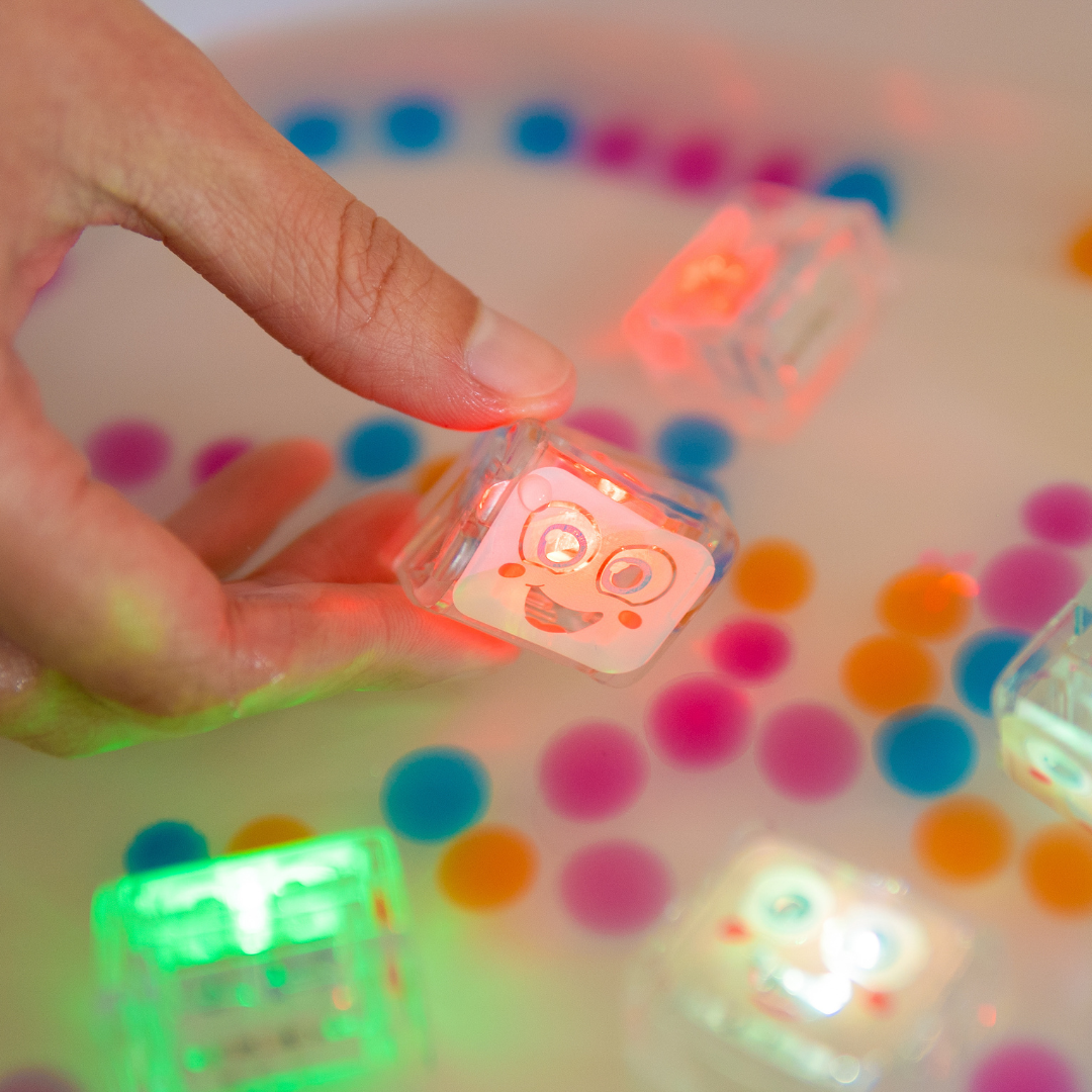 Red light up cubes in water