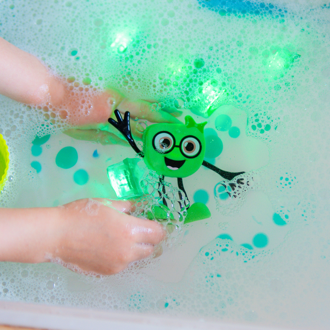 Close up of hands holding a glo pals character
