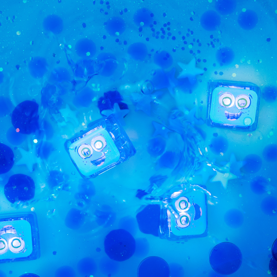 Blue light up cubes in water