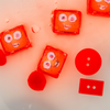 Red Glo Pals Cubes in Water