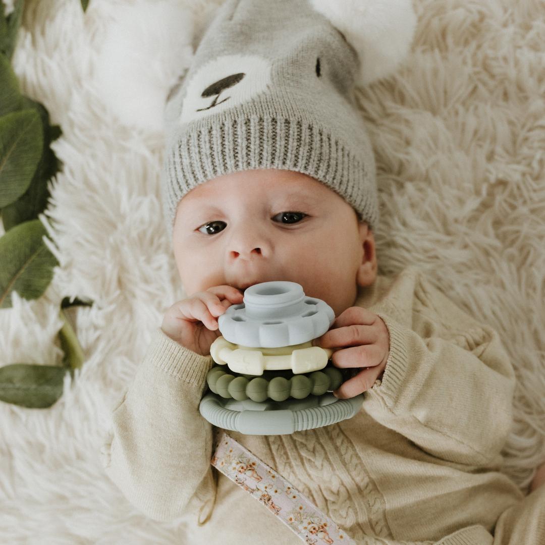 Baby chewing May Gibbs silicone stacker