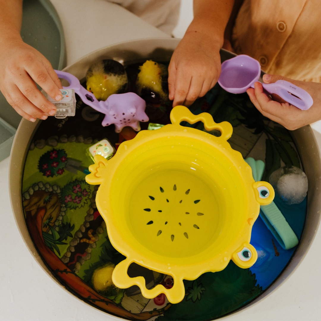 Kids playing with sensory tray