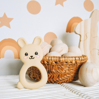 Silicone Bunny Teether near wooden eggs