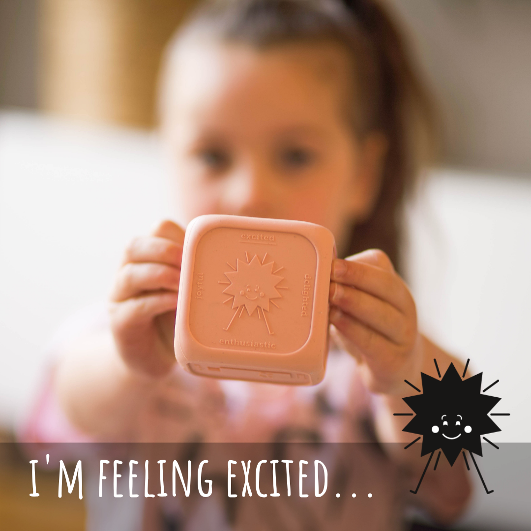 Girl holding feelings cube