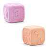 Pink and Peach Silicone Dice on White Background