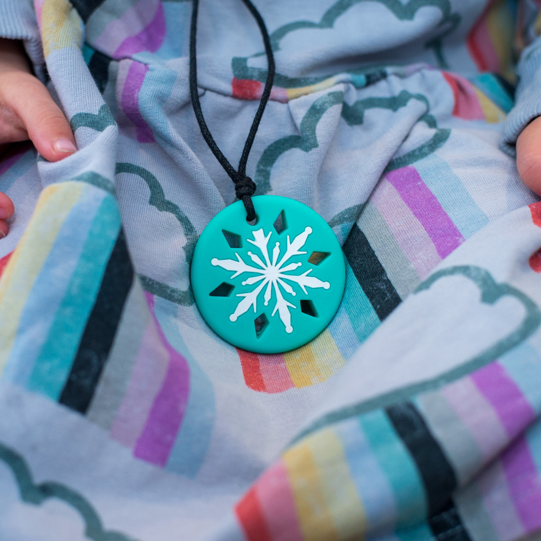 Close up of a snowflake pendant